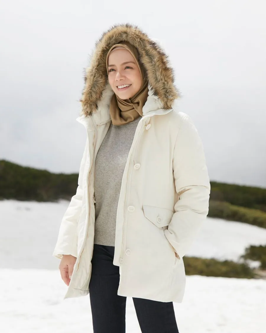 Muslim woman wearing a fur hooded coat