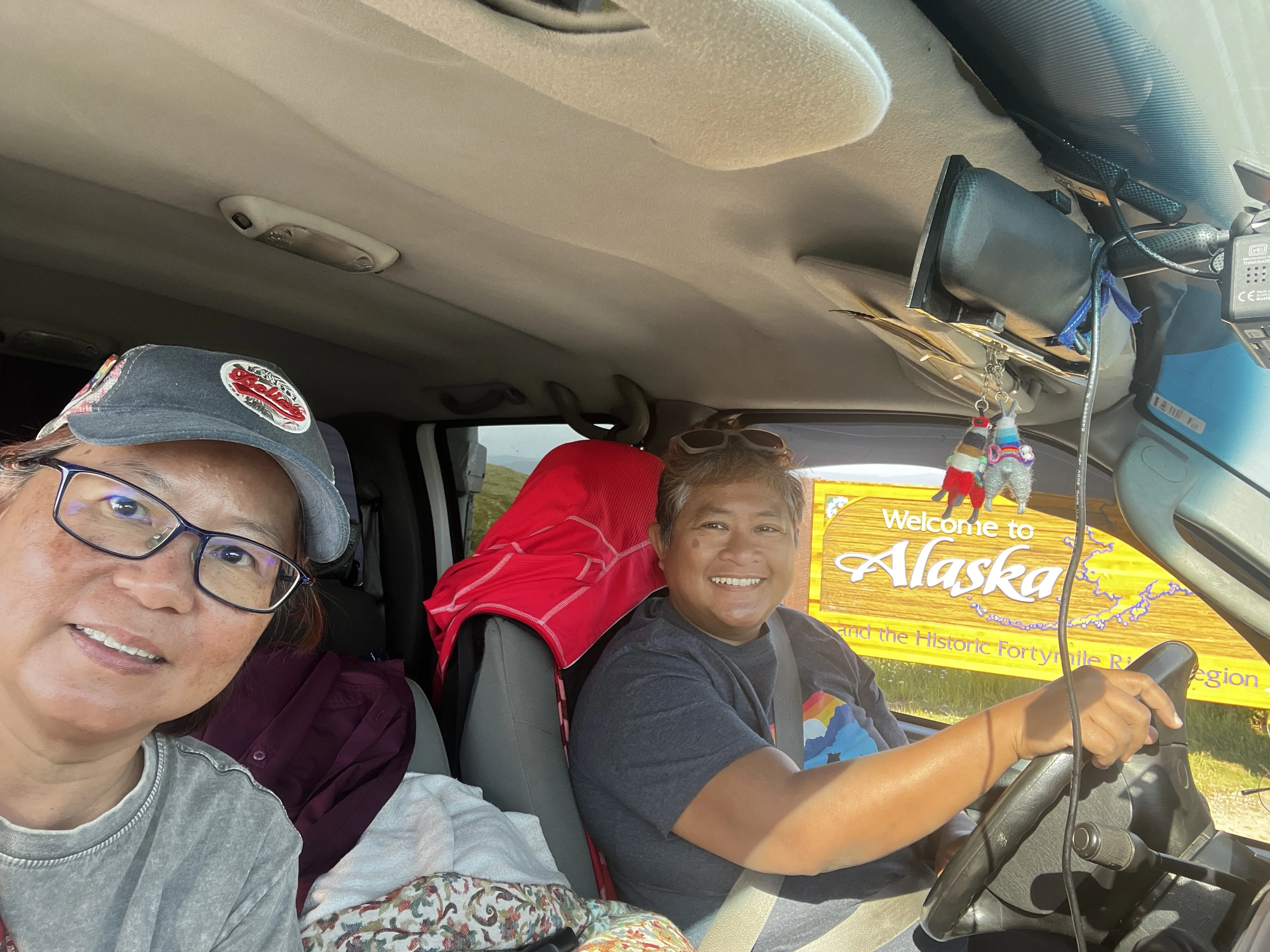 Two woman inside a van driving
