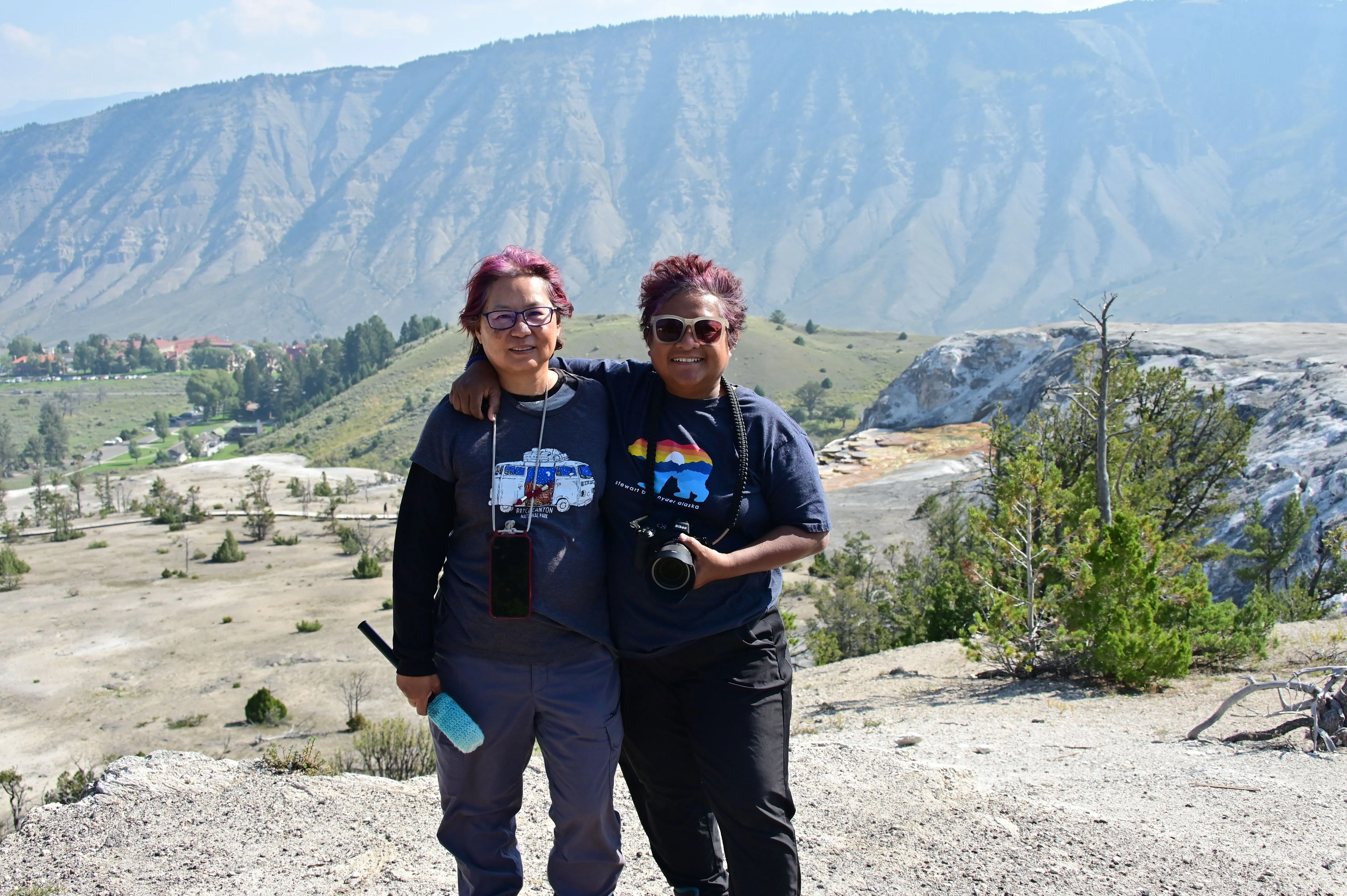Two women taking a picture at Yellowstone