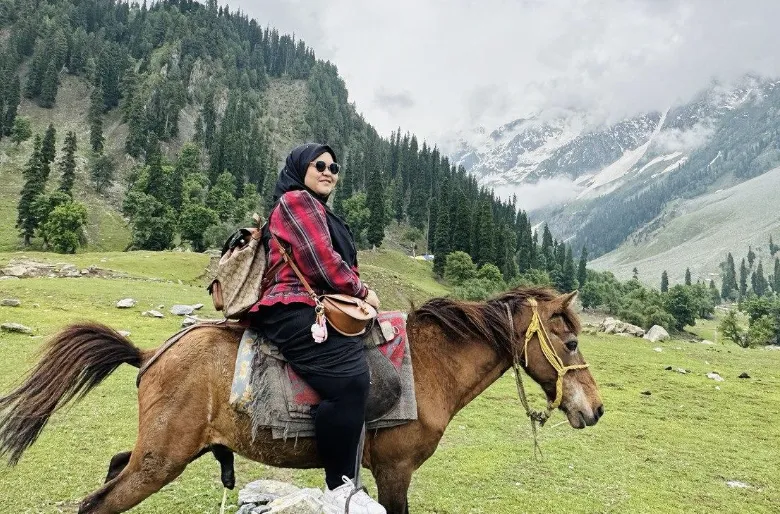 A woman on a pony