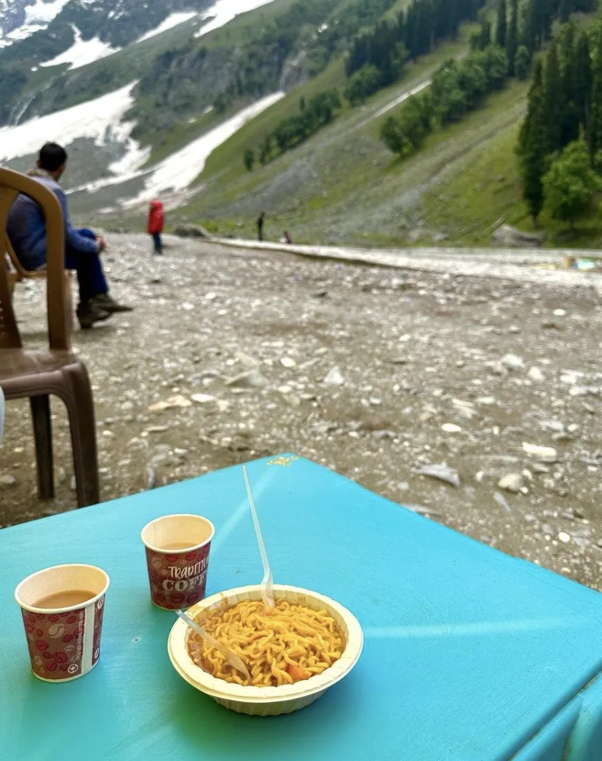 Chai Tea and Maggie Curry Infront of a Glacier