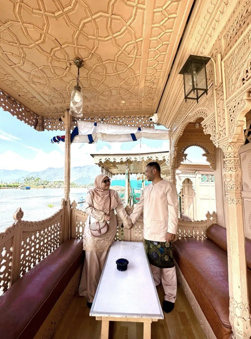 A couple standing in the houseboat