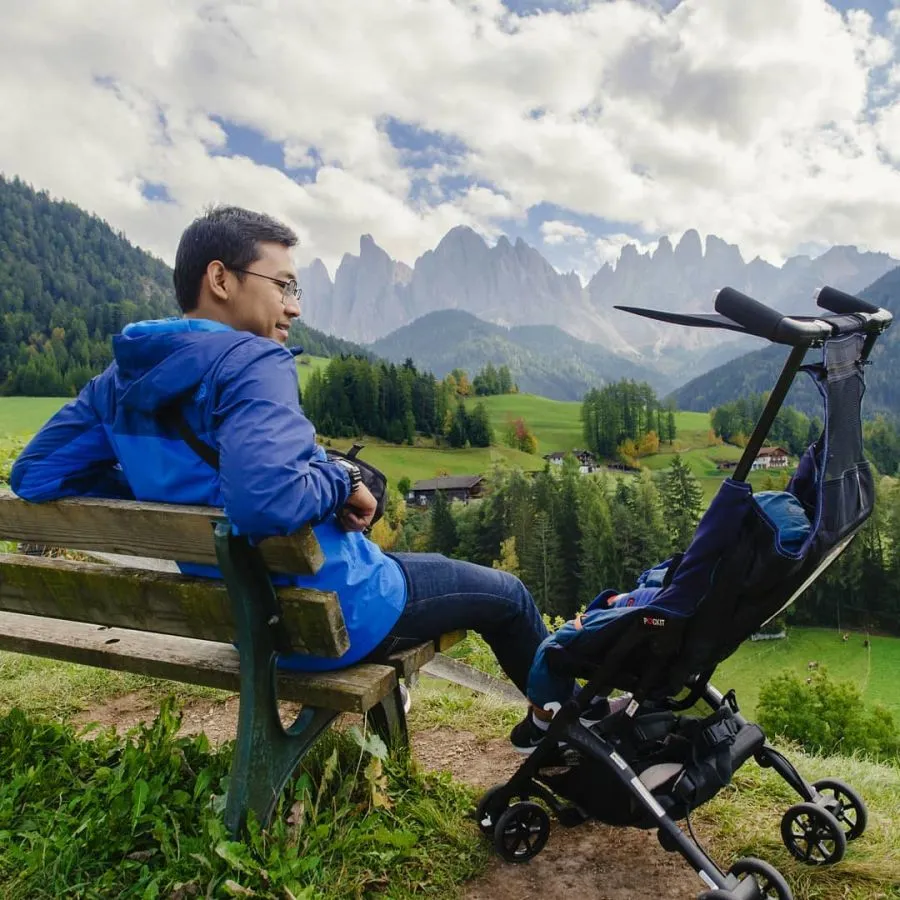 Father with child in a stroller
